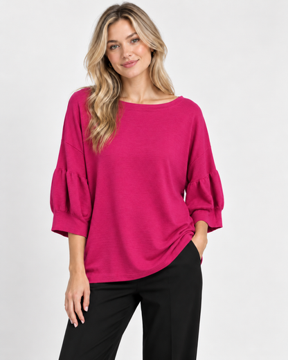 7135 Scoop Jumper with Puff Sleeves in Fuchsia, front model view with black trousers