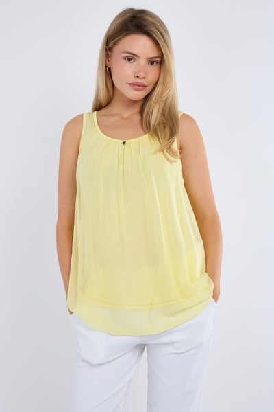 SILK LINED VEST WITH HEART PENDANT