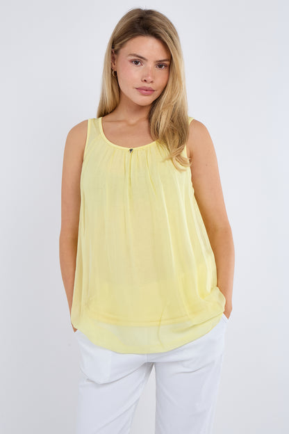SILK LINED VEST WITH HEART PENDANT