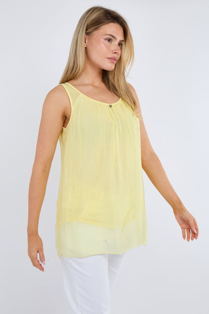 SILK LINED VEST WITH HEART PENDANT