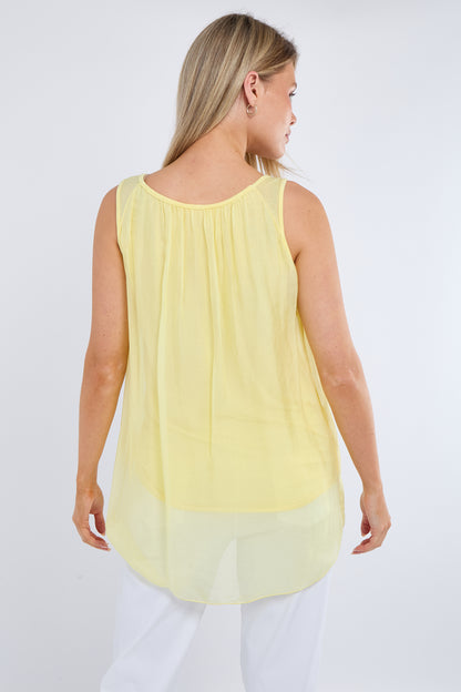 SILK LINED VEST WITH HEART PENDANT